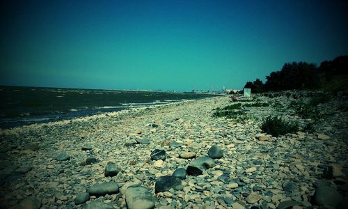 Scenic view of sea against clear sky