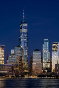 Illuminated buildings in city at night