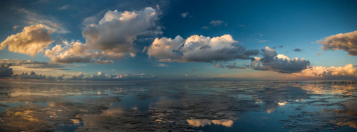Panoramic view of sea against sky during sunset
