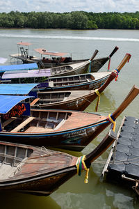High angle view of fishing boats moored in lake