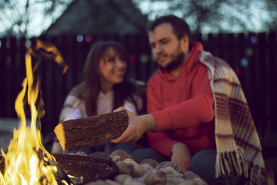 Man and woman at market stall