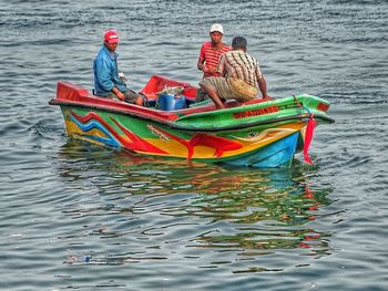 People on boat sailing in sea