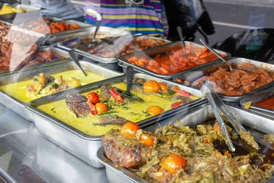 High angle view of food on barbecue grill