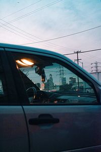 Reflection of sky on car windshield