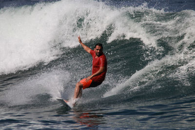 Man surfing in sea