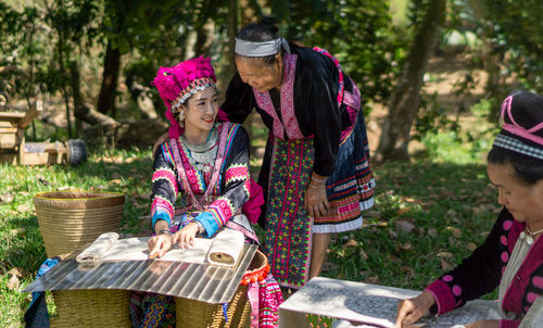 Low angle view of two people in basket