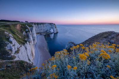 Scenic view of sea against sky during sunset