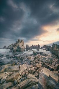 Scenic view of sea against sky during sunset