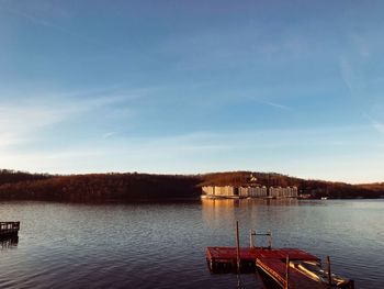 Pier over lake against sky