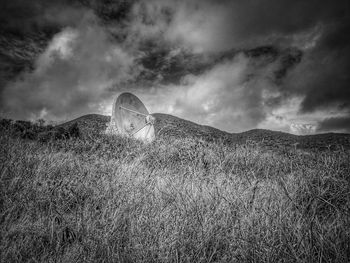 Man against cloudy sky