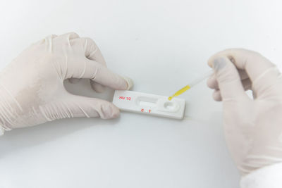 Close-up of human hand performing medical test