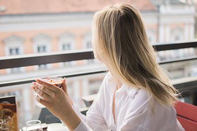 Young woman using mobile phone