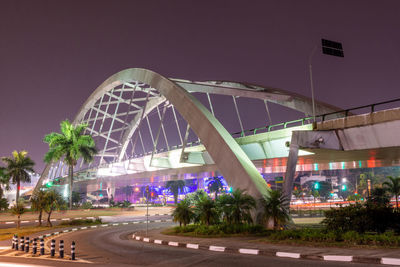 View of bridge in city at night