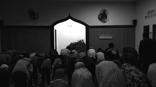 Rear view of people at temple