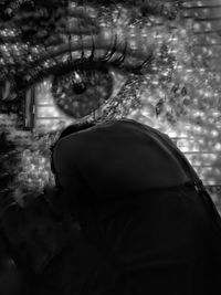 Close-up portrait of woman in snow