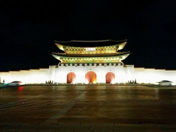 Illuminated temple at night