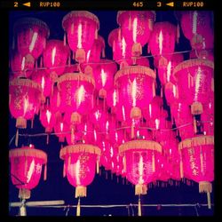 Low angle view of multi colored lanterns for sale