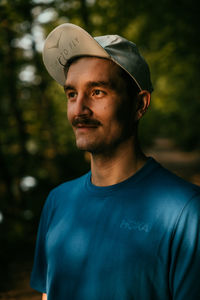 Portrait of young man looking away