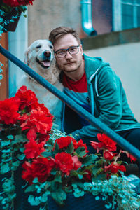 Portrait of man with dog