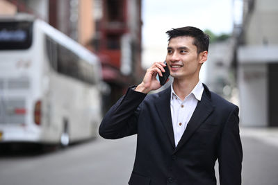 Young man using mobile phone