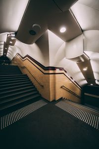 Low angle view of illuminated staircase in building