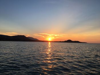 Scenic view of sea against sky during sunset