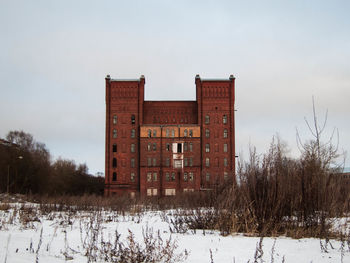 Built structure against sky during winter