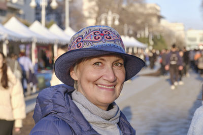 Portrait of woman wearing hat