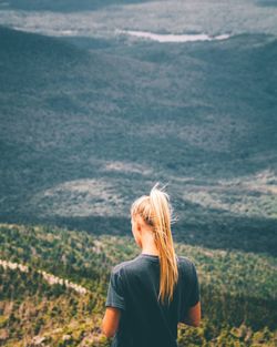 Rear view of woman looking at sea