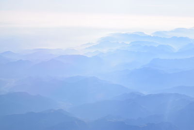 Scenic view of mountains in foggy weather