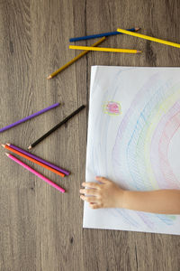 High angle view of colored pencils on table