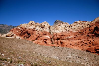 Scenic view of red rock canyon mountains against clear sky