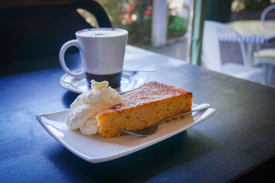 Cup of coffee with cake. cafe scene, coffee break with dessert