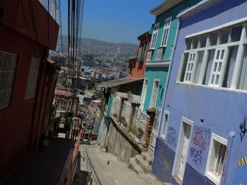 High angle view of street amidst buildings in town