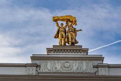 Low angle view of statue of liberty against sky