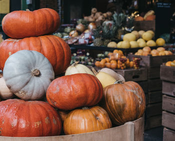 Close-up of pumpkins for sale at market stall