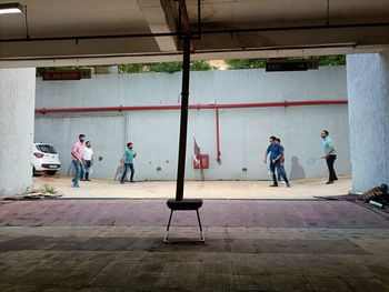 Group of people walking in building