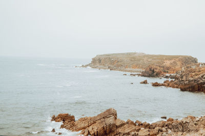 Scenic view of sea against clear sky