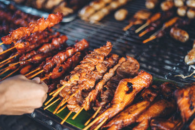 Close-up of meat on barbecue grill