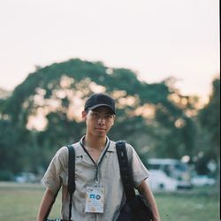 Portrait of young man standing outdoors