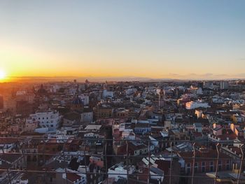 High angle view of townscape against sky during sunset