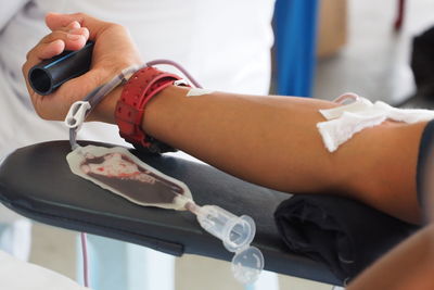 Cropped image of patient at blood bank