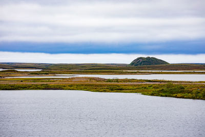 Scenic view of land against sky