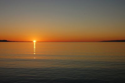 Scenic view of sunset over river