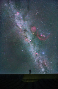 High angle view of people swimming in sea