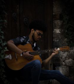 Young man playing guitar