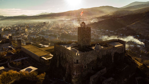 High angle view of townscape against sky during sunset