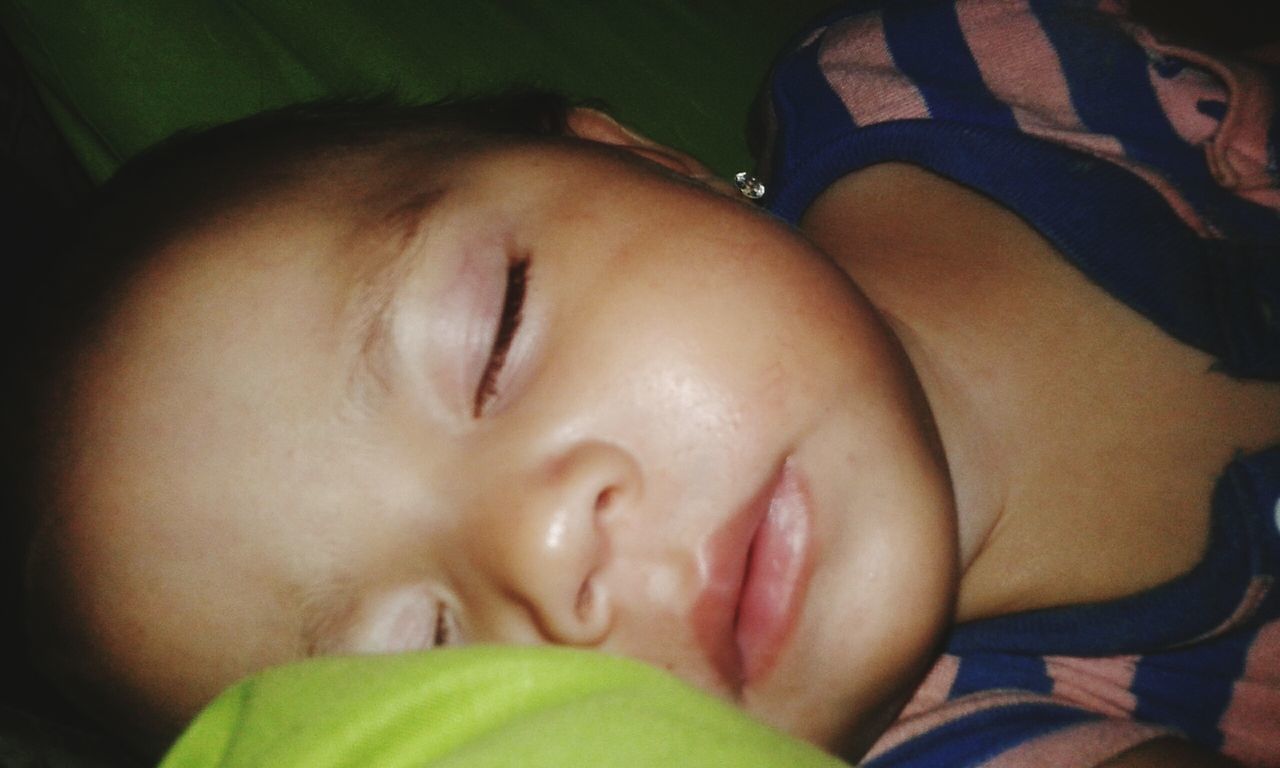 CLOSE-UP OF SLEEPING BOY