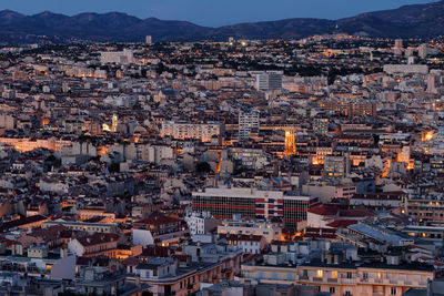 High angle view of townscape against sky at dusk