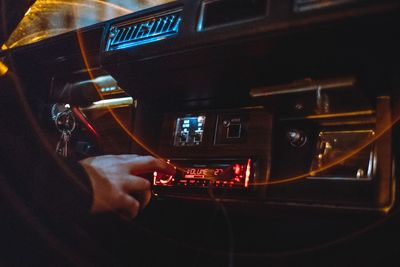 Man photographing through airplane window